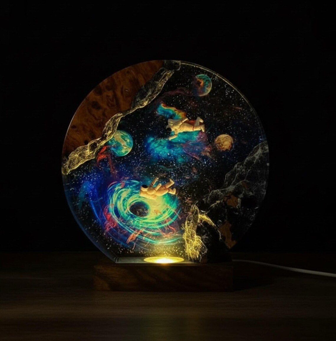Black hole galaxy resin lamp lit in the dark