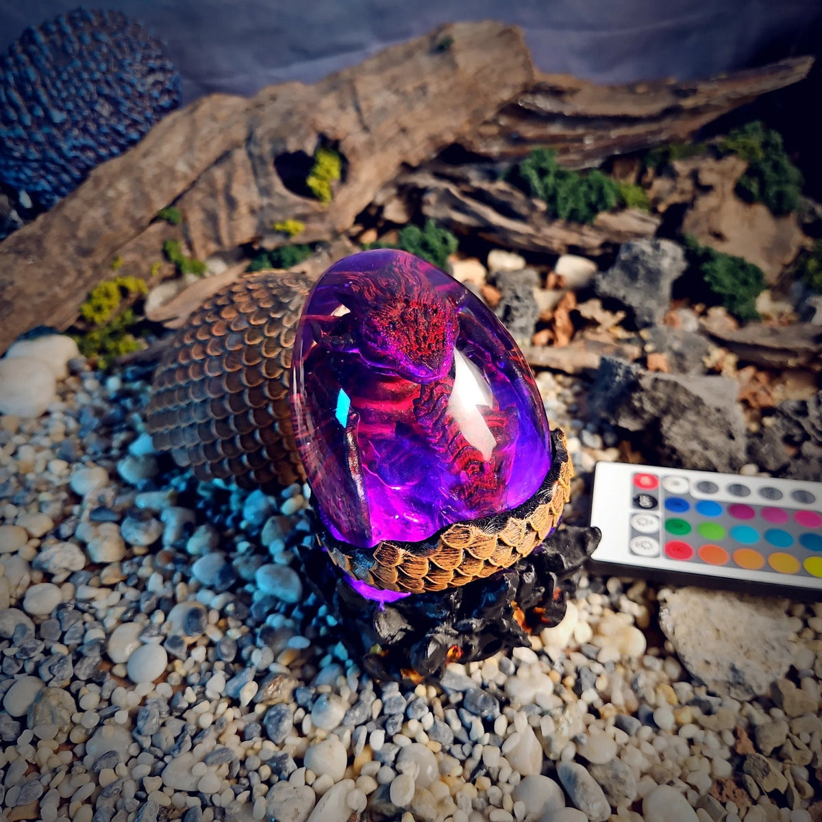 Crimson dragon egg lamp glowing violet
