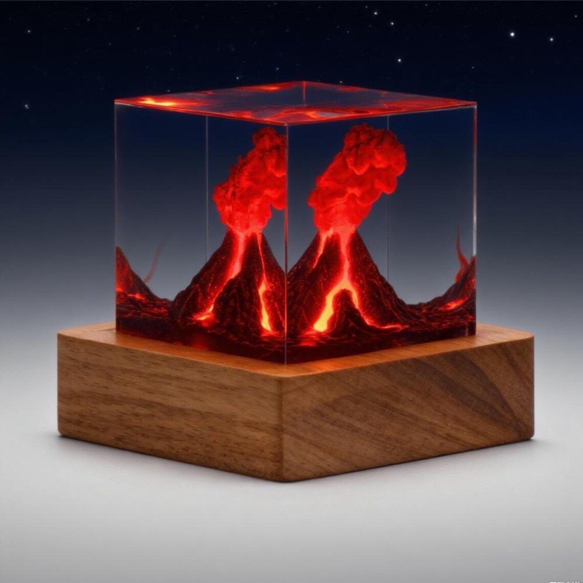 Erupting volcano epoxy cube under a starry backdrop