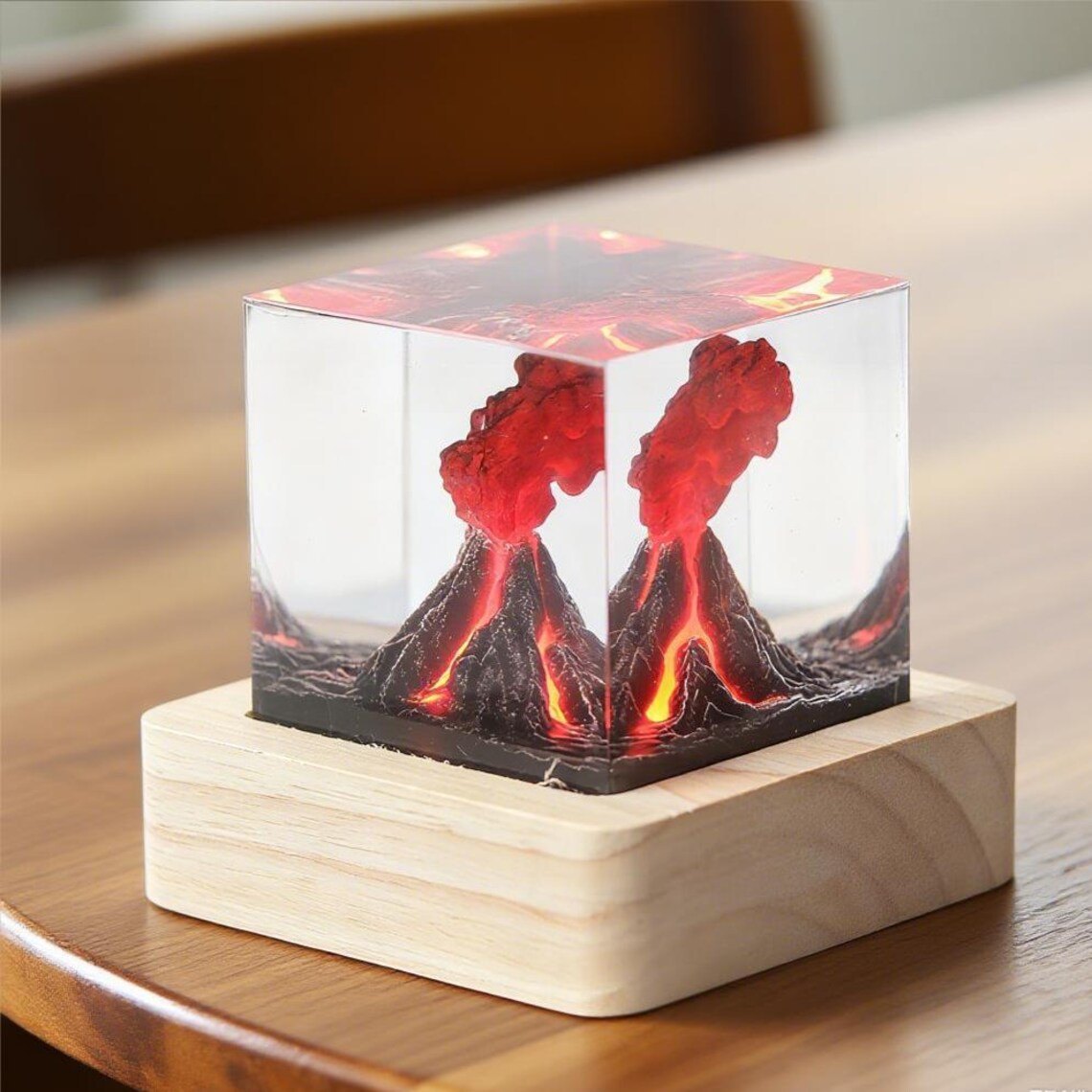 Close-up of volcano lava cube on a light wood base