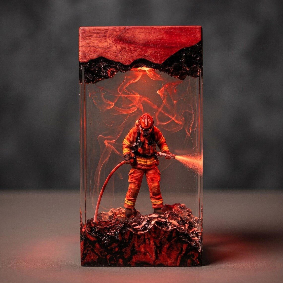 Firefighter resin lamp with hose spray and red smoke