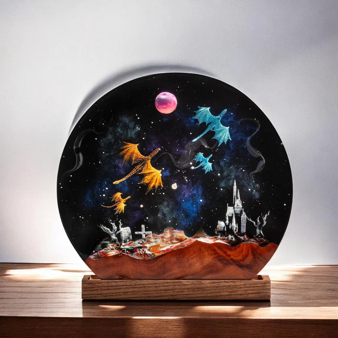 Round dragon resin lamp with dragons in a galaxy sky above a castle