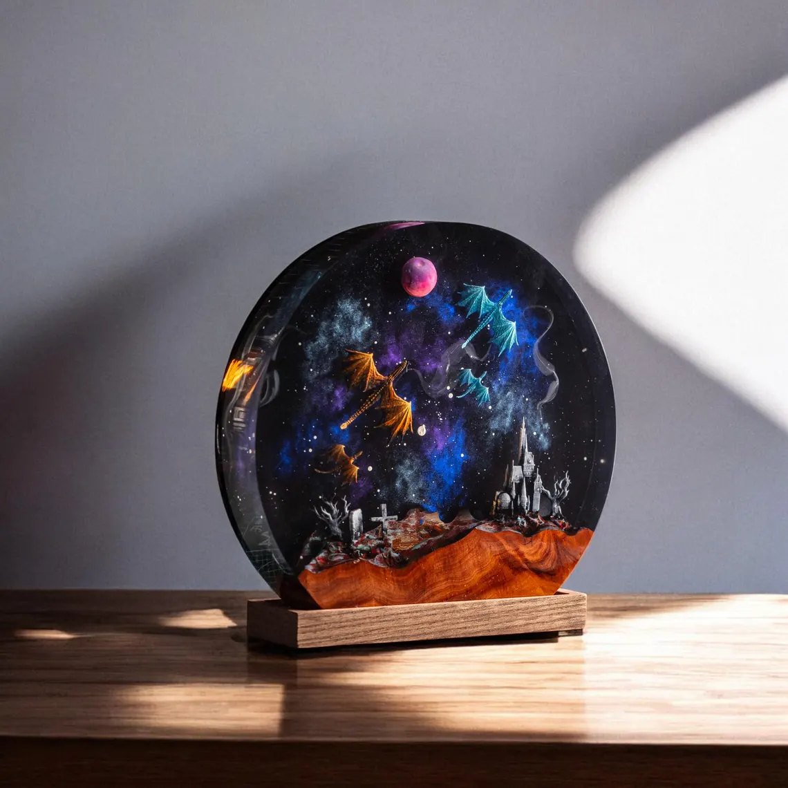 Galaxy dragons resin disc on a light wood tray base