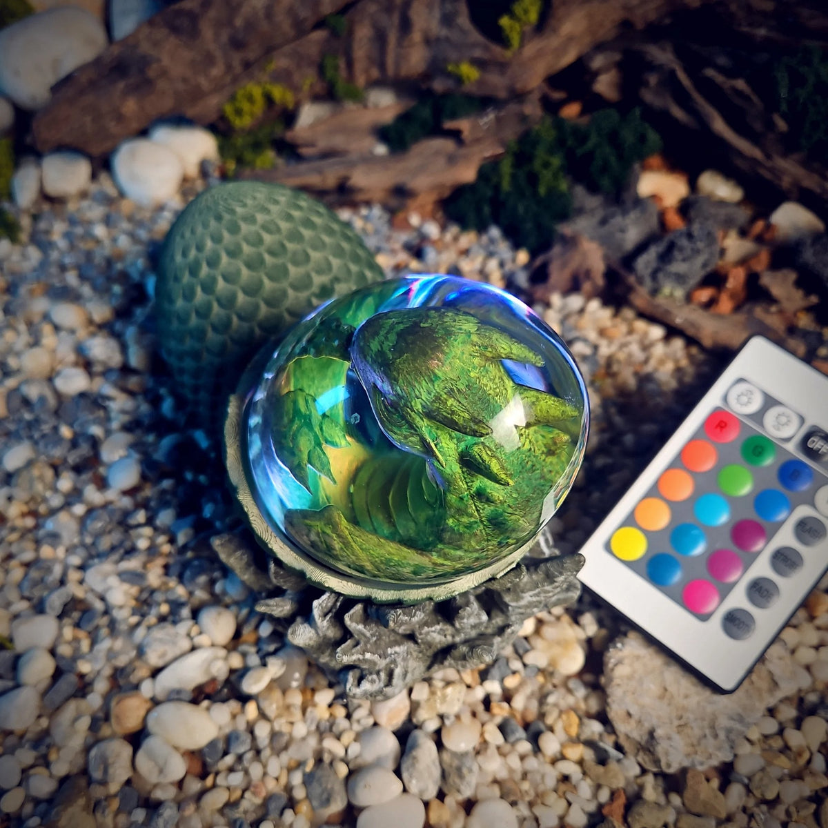 Green baby dragon egg lamp glowing blue-white with remote