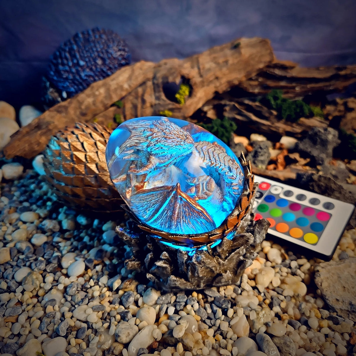 Pearl white dragon egg lamp glowing cyan blue