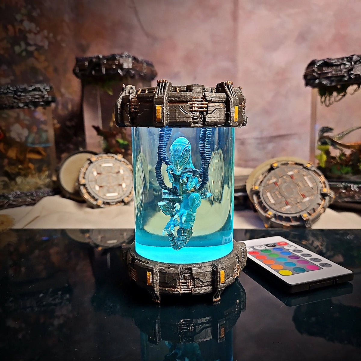 Dinosaur lab capsule resin lamp glowing aqua with remote