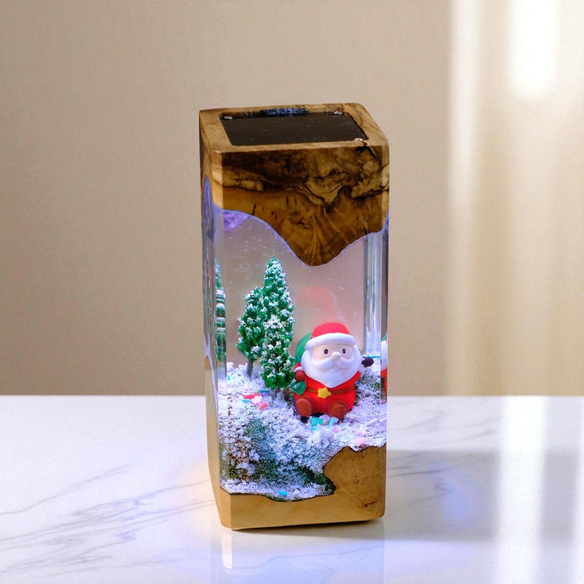 Santa Christmas resin lamp in light burl wood on marble