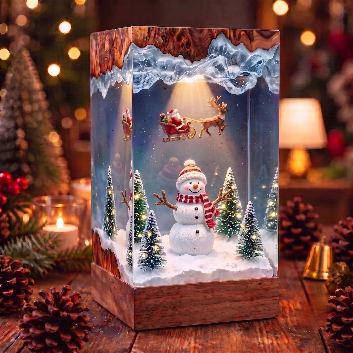 Christmas snowman resin lamp among pinecones