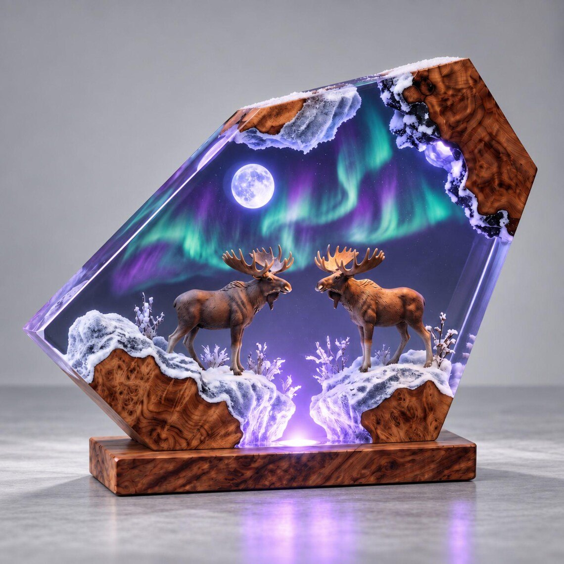 Moose resin lamp with aurora and full moon lit in violet